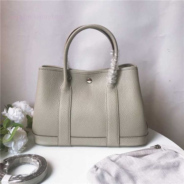 designer herbag garden party evening women's layer cowhide litchi pattern fashion handheld one shoulder crossbody big bag 2y0t
designer herbag garden party evening women's layer cowhide litchi pattern fashion handheld one shoulder crossbody big bag 2y0t