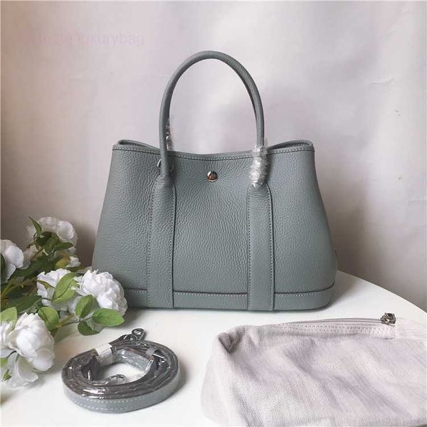 designer herbag garden party evening women's layer cowhide litchi pattern fashion handheld one shoulder crossbody big bag b0te
designer herbag garden party evening women's layer cowhide litchi pattern fashion handheld one shoulder crossbody big bag b0te
