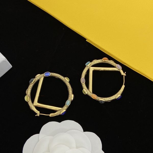 shiny diamond hoop earrings, crystal earrings, gold and silver earrings, interlocking letter earrings, Golden;silver
shiny diamond hoop earrings, crystal earrings, gold and silver earrings, interlocking letter earrings, Golden;silver