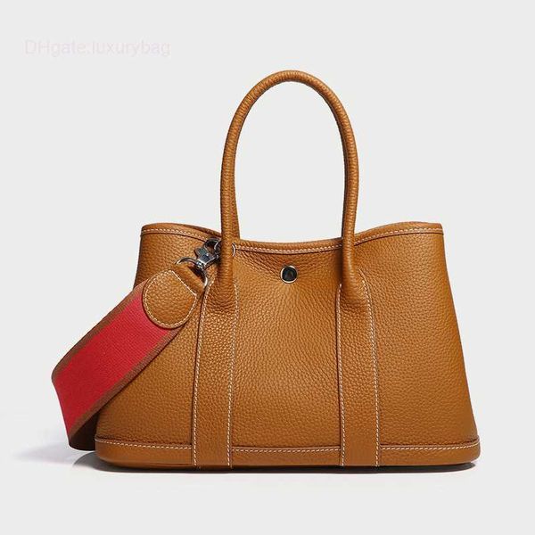 designer herbag garden party evening garden baotou cowhide lizhi pattern women's bag casual one color contrast wide shoulder belt handb
designer herbag garden party evening garden baotou cowhide lizhi pattern women's bag casual one color contrast wide shoulder belt handb