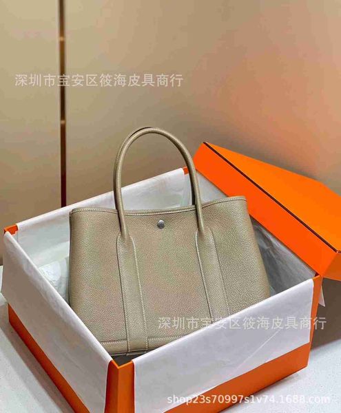designer herbag garden party evening h family 2023 new garden premium feel hand sewn honey wax thread cowhide portable women's bag 1yow
designer herbag garden party evening h family 2023 new garden premium feel hand sewn honey wax thread cowhide portable women's bag 1yow