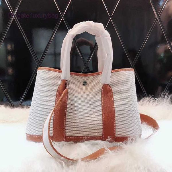 designer herbag garden party evening 2023 spring new layer cowhide colored canvas garden large capacity handheld women's bag mscw
designer herbag garden party evening 2023 spring new layer cowhide colored canvas garden large capacity handheld women's bag mscw