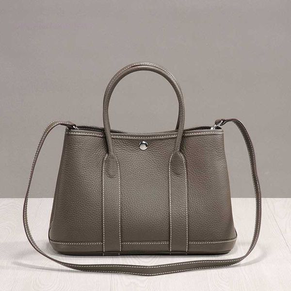 designer herbag garden party evening korean version of simple 2023 lychee head layer cow portable casual leather shoulder for women garden b
designer herbag garden party evening korean version of simple 2023 lychee head layer cow portable casual leather shoulder for women garden b