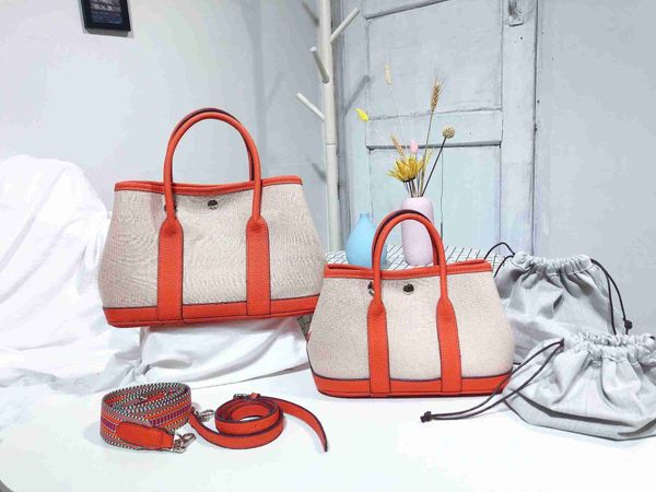 designer herbag garden party evening h fashion canvas contrast color simple large capacity wide shoulder strap handheld crossbody women'
designer herbag garden party evening h fashion canvas contrast color simple large capacity wide shoulder strap handheld crossbody women'