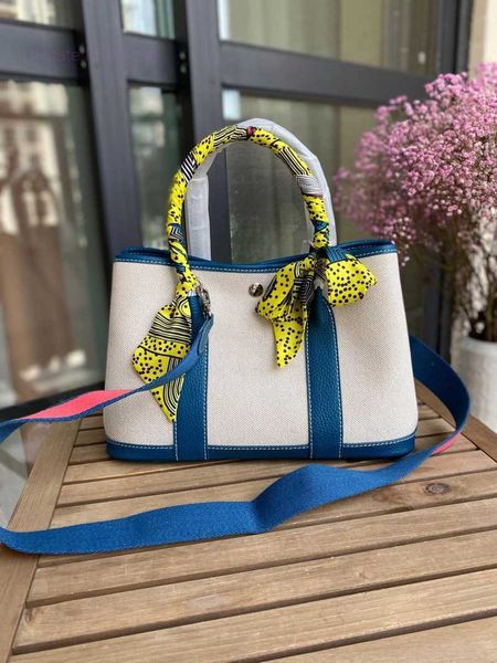 designer herbag garden party evening 2023 spring new canvas with layer cowhide garden fashion hand color contrast versatile messenger bag 03
designer herbag garden party evening 2023 spring new canvas with layer cowhide garden fashion hand color contrast versatile messenger bag 03