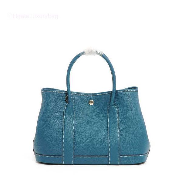 designer herbag garden party evening autumn and winter shopping lychee grain layer cowhide women's garden leather vegetable basket hand
designer herbag garden party evening autumn and winter shopping lychee grain layer cowhide women's garden leather vegetable basket hand
