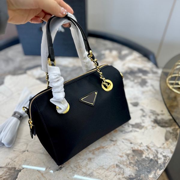 triangle badge designer nylon pillow shoulder bags gold metal hardware shoulder handbags large capacity luxury designer handbags 22x9x16cm f
triangle badge designer nylon pillow shoulder bags gold metal hardware shoulder handbags large capacity luxury designer handbags 22x9x16cm f