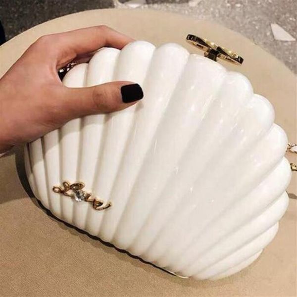 elegant ivory pearl shell wristband bag brand clutch wallet designer chain shoulder bag luxury vip gift purse black pearl she311b
elegant ivory pearl shell wristband bag brand clutch wallet designer chain shoulder bag luxury vip gift purse black pearl she311b