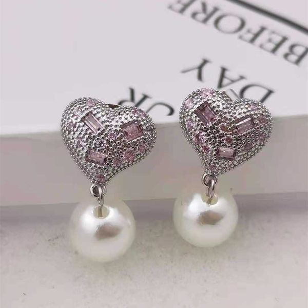 miao jia's pink crystal heart shaped pearl earrings with high grade feeling and temperament geometric diamond, Golden
miao jia's pink crystal heart shaped pearl earrings with high grade feeling and temperament geometric diamond, Golden