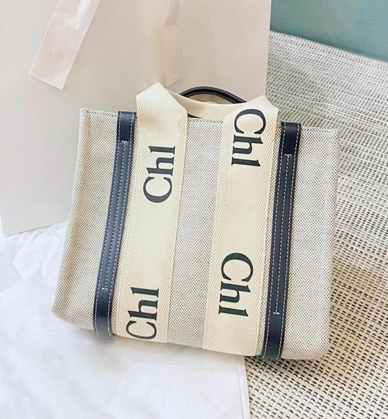 luxurys designer totes woody beach shopping bag weekend basket womens shoulder bag duffel mens wallet canvas pochette linen crossb2007021
luxurys designer totes woody beach shopping bag weekend basket womens shoulder bag duffel mens wallet canvas pochette linen crossb2007021