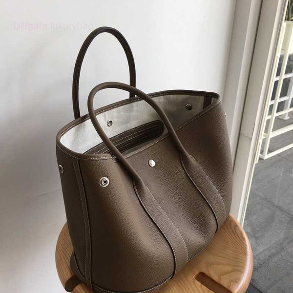 designer herbag garden party evening togo layer cowhide garden senior sensitive commuter tote women's large-capacity leather handbag cb
designer herbag garden party evening togo layer cowhide garden senior sensitive commuter tote women's large-capacity leather handbag cb