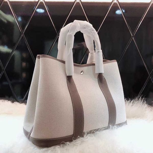 designer herbag garden party evening 2023 spring new layer cowhide colored canvas garden large capacity handheld women's bag n11l
designer herbag garden party evening 2023 spring new layer cowhide colored canvas garden large capacity handheld women's bag n11l