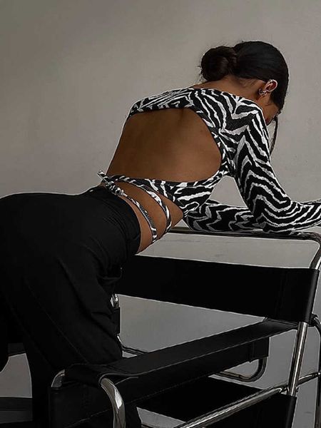 women's long sleeved round neck t-shirt sweater bare back lace up black autumn, White
women's long sleeved round neck t-shirt sweater bare back lace up black autumn, White