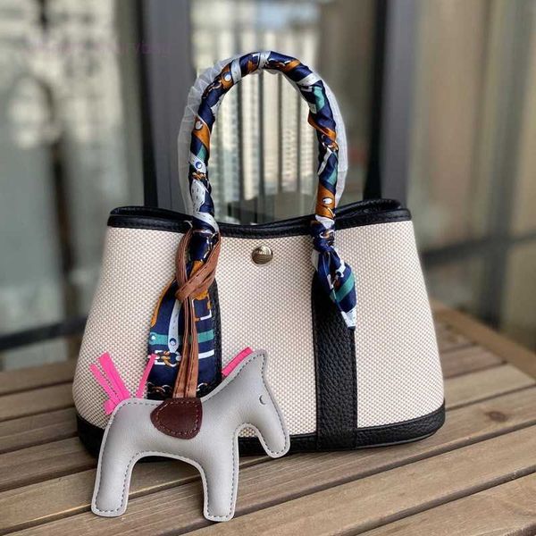 designer herbag garden party evening 2023 spring new canvas with layer cowhide garden fashion hand color contrast versatile messenger bag bt
designer herbag garden party evening 2023 spring new canvas with layer cowhide garden fashion hand color contrast versatile messenger bag bt