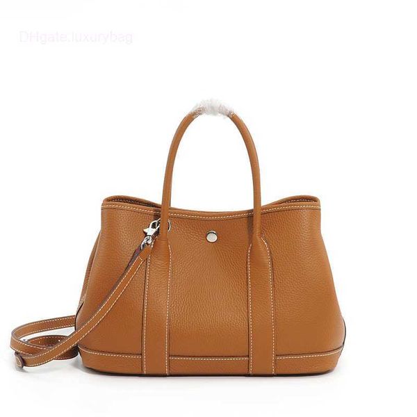 designer herbag garden party evening korean version of simple 2023 lychee head layer cow portable casual leather shoulder for women garden b
designer herbag garden party evening korean version of simple 2023 lychee head layer cow portable casual leather shoulder for women garden b