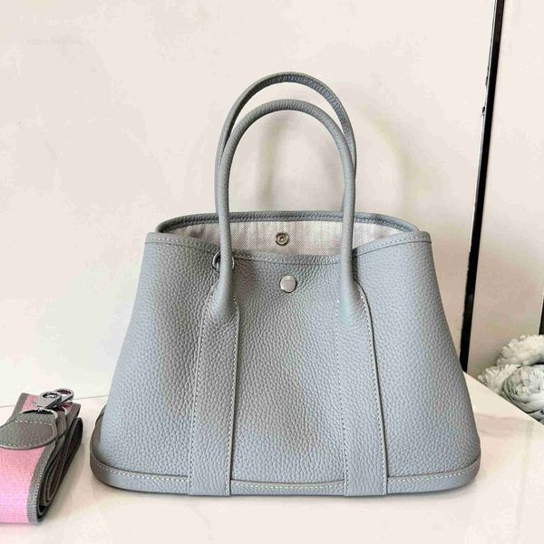 designer herbag garden party evening lychee grain layer cow leather single shoulder messenger with large capacity portable versatile women&#
designer herbag garden party evening lychee grain layer cow leather single shoulder messenger with large capacity portable versatile women&#