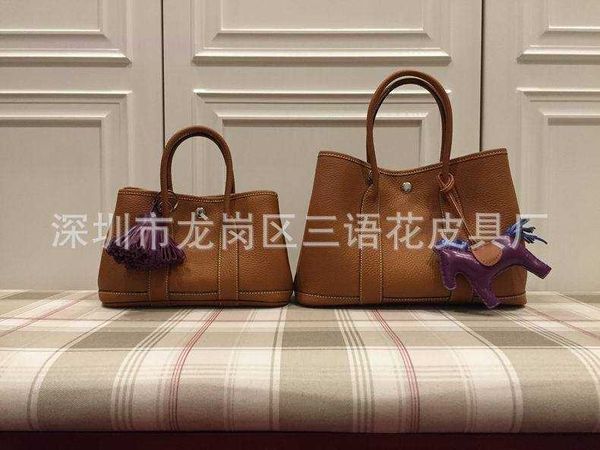 designer herbag garden party evening 2023 korean version new leisure simple hand women's shoulder layer cowhide garden bag 24cm30cm q54
designer herbag garden party evening 2023 korean version new leisure simple hand women's shoulder layer cowhide garden bag 24cm30cm q54