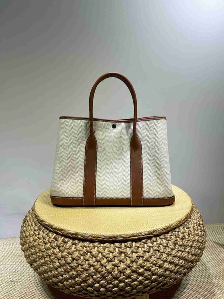 designer herbag garden party evening genuine leather one shoulder crossbody tote canvas cowhide handbag large capacity shopping bag 05th
designer herbag garden party evening genuine leather one shoulder crossbody tote canvas cowhide handbag large capacity shopping bag 05th