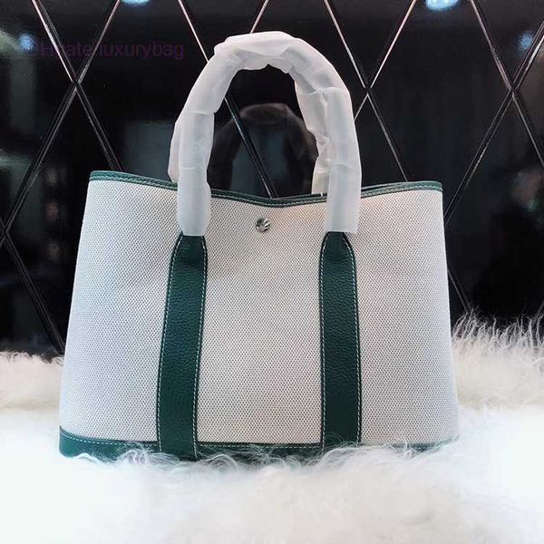 designer herbag garden party evening 2023 spring new layer cowhide colored canvas garden large capacity handheld women's bag a65r
designer herbag garden party evening 2023 spring new layer cowhide colored canvas garden large capacity handheld women's bag a65r