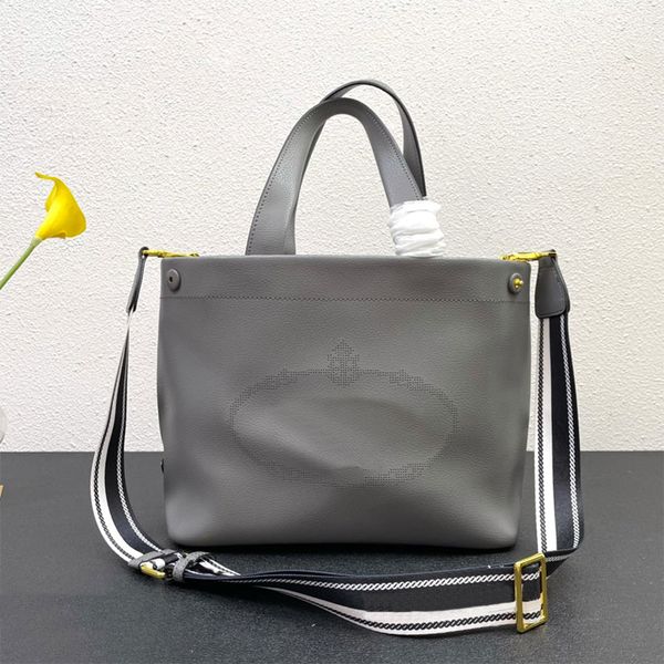 calfskin leather tote bag men women handbag purse large capacity shopping bags laser carving letters enameled metal triangle shoulder handba
calfskin leather tote bag men women handbag purse large capacity shopping bags laser carving letters enameled metal triangle shoulder handba