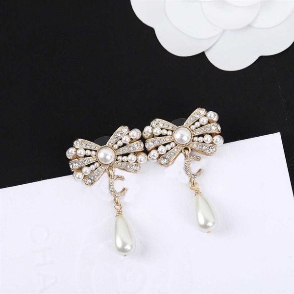 2022 charm drop earring with diamond and nature shell beads knot shape for women wedding jewelry gift have box ps7800206p, Golden
2022 charm drop earring with diamond and nature shell beads knot shape for women wedding jewelry gift have box ps7800206p, Golden