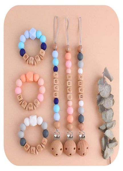 fashion diy natural and organic silicone and wood baby pacifier clipbaby teether 2pcsset teething clips safe teething chain toys3463077
fashion diy natural and organic silicone and wood baby pacifier clipbaby teether 2pcsset teething clips safe teething chain toys3463077