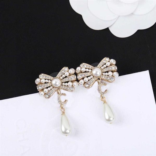 2022 charm drop earring with diamond and nature shell beads knot shape for women wedding jewelry gift have box ps7800338j, Golden
2022 charm drop earring with diamond and nature shell beads knot shape for women wedding jewelry gift have box ps7800338j, Golden