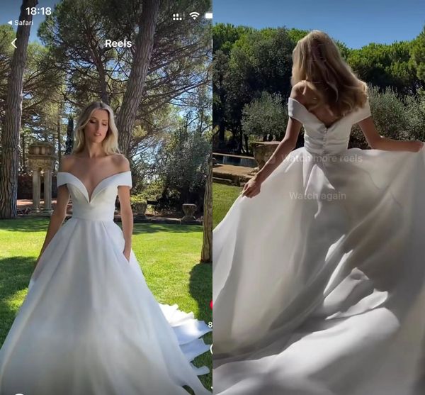 v neck off the shoulder a line wedding dresses with pockets elegant satin pleated boho garden beach bridal gowns sweep train buttons back ro, White
v neck off the shoulder a line wedding dresses with pockets elegant satin pleated boho garden beach bridal gowns sweep train buttons back ro, White