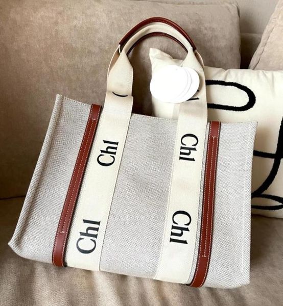 5a quality shopping bags totes large beach canvas clutch woody luxurys handbag shoulder designers womens crossbody whole walle3994797
5a quality shopping bags totes large beach canvas clutch woody luxurys handbag shoulder designers womens crossbody whole walle3994797