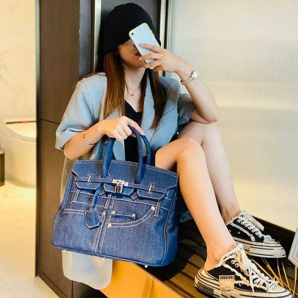 h ermes birkin fashion brand trouser pocket design horizontal edition bag ins net red denim hand bill of lading shoulder messenger bag
h ermes birkin fashion brand trouser pocket design horizontal edition bag ins net red denim hand bill of lading shoulder messenger bag