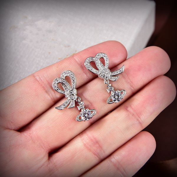 fashion designer brand stud earring for woman letter vivian diamond pearl gold hoop earing westwood women trend saturn earrings hger3, Golden;silver
fashion designer brand stud earring for woman letter vivian diamond pearl gold hoop earing westwood women trend saturn earrings hger3, Golden;silver