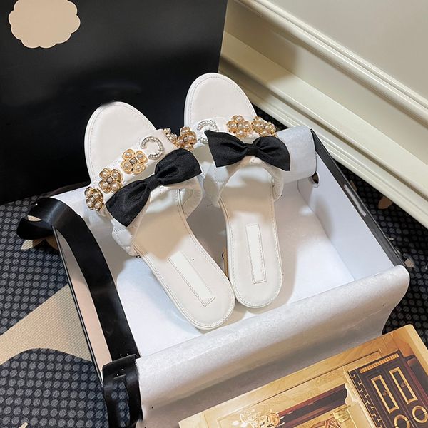 designer womens slippers flat sandals leather bow camellia pearl rhinestone hardware accessories solid color outdoor beach shoe ballet shoe, Black
designer womens slippers flat sandals leather bow camellia pearl rhinestone hardware accessories solid color outdoor beach shoe ballet shoe, Black