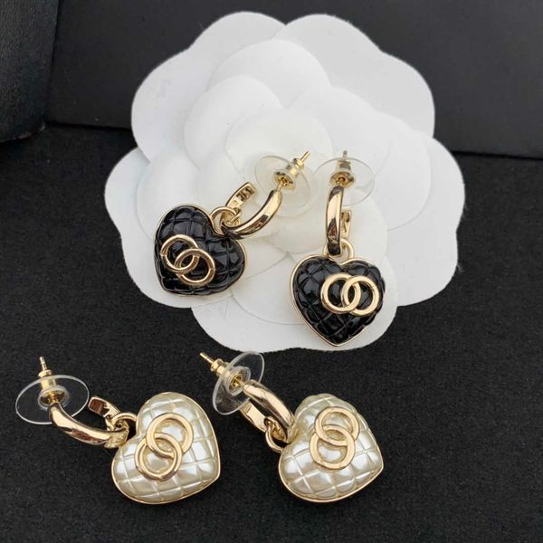 Other Fashion Accessories European and American retro black and white diamond shaped love heart pendant earrings female ear hook
Other Fashion Accessories European and American retro black and white diamond shaped love heart pendant earrings female ear hook