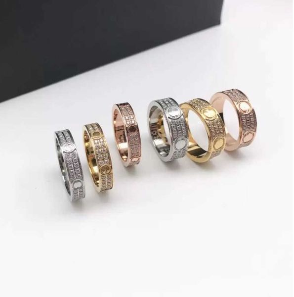 with side stones full diamond titanium steel silver love ring men and women rose gold designer rings for lovers couple luxury jewelry gift m
with side stones full diamond titanium steel silver love ring men and women rose gold designer rings for lovers couple luxury jewelry gift m