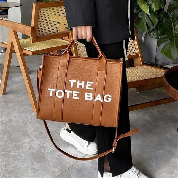 designer bag 2023 new bag net red solid pu letter tote bag minimalist small and large capacity oblique straddle handbag factory outlet
designer bag 2023 new bag net red solid pu letter tote bag minimalist small and large capacity oblique straddle handbag factory outlet