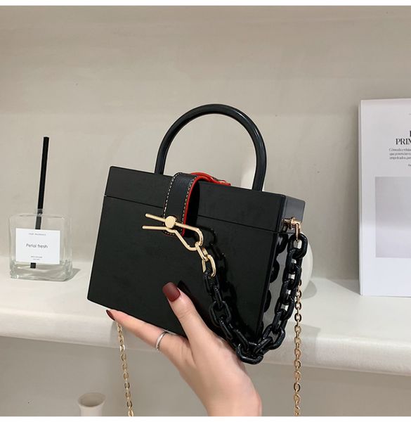 evening bags pvc box shape bag acrylic portable chain handbag luxury bow women designer party small lady purses 230424
evening bags pvc box shape bag acrylic portable chain handbag luxury bow women designer party small lady purses 230424