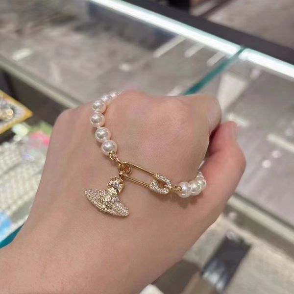 luxury saturn pearl bracelets woman chain with logo 18k golden classic paperclip bracelets never fade, Black
luxury saturn pearl bracelets woman chain with logo 18k golden classic paperclip bracelets never fade, Black