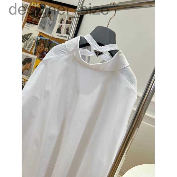 women's blouses & shirts designer 23 spring/summer new product polo neck long sleeve white shirt dress off shoulder cross strap design
women's blouses & shirts designer 23 spring/summer new product polo neck long sleeve white shirt dress off shoulder cross strap design