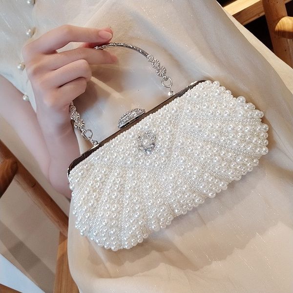 evening bags 2023 pearl banquet handbag korean version diamond inlaid women's diagonal chain small dress bride clutch 230424
evening bags 2023 pearl banquet handbag korean version diamond inlaid women's diagonal chain small dress bride clutch 230424