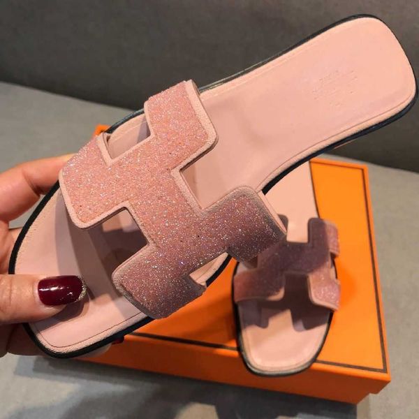 2023 genuine womens luxurys slides designer leather slippers oran versatile flash sandals diamond net red flat bottom 8tcd
2023 genuine womens luxurys slides designer leather slippers oran versatile flash sandals diamond net red flat bottom 8tcd
