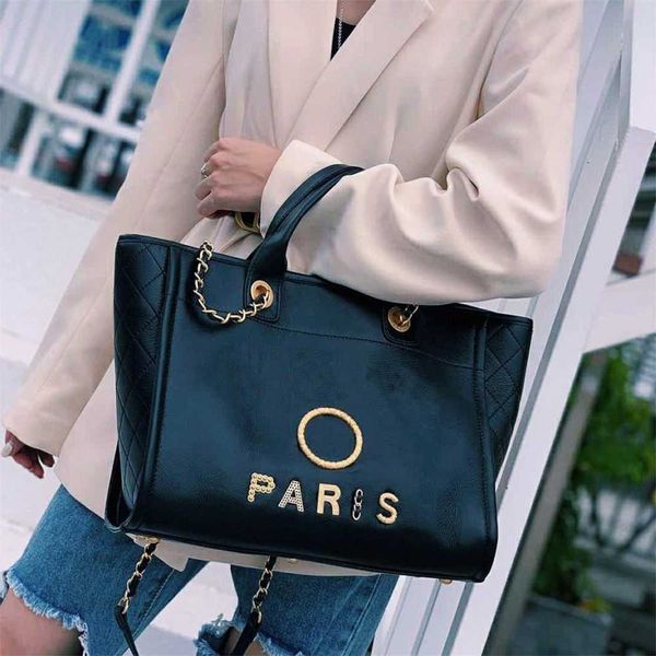 luxury classic handbags beach bags brand metal badge tote bag small evening handbag female capacity large leather one shoulder backpack 5zjr 
luxury classic handbags beach bags brand metal badge tote bag small evening handbag female capacity large leather one shoulder backpack 5zjr