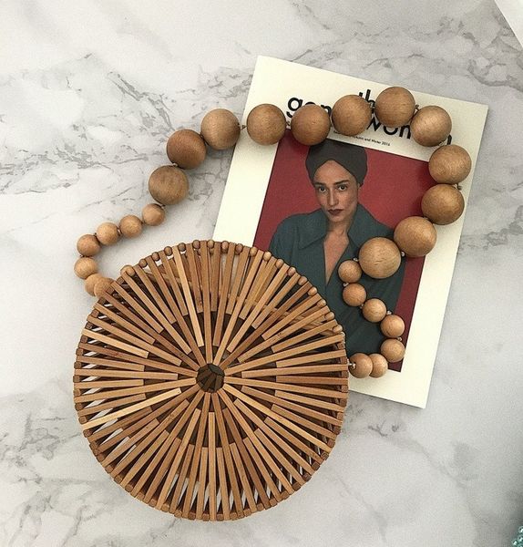 shopping bags wood bead shoulder bag portable woven circular hollow out round bamboo crossbody vintage summer beach basket clutch 230426
shopping bags wood bead shoulder bag portable woven circular hollow out round bamboo crossbody vintage summer beach basket clutch 230426