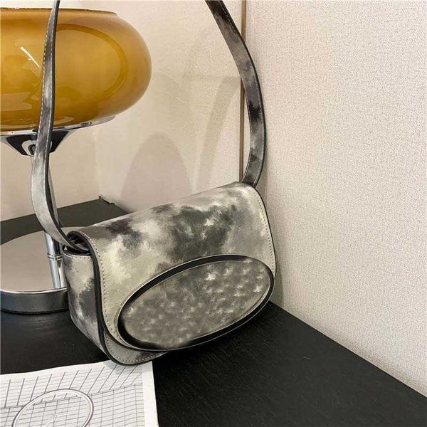 die small design dingdang bag 2023 new summer fashion trend one shoulder y2k rhyme and dye cool crossbody bag versatile portable saddle wall
die small design dingdang bag 2023 new summer fashion trend one shoulder y2k rhyme and dye cool crossbody bag versatile portable saddle wall
