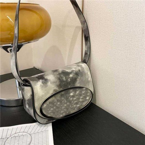 die small design dingdang bag 2023 new summer fashion trend one shoulder y2k rhyme and dye cool crossbody bag versatile portable saddle wall
die small design dingdang bag 2023 new summer fashion trend one shoulder y2k rhyme and dye cool crossbody bag versatile portable saddle wall