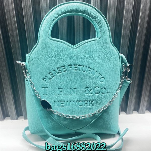 real cowhide bucket bag women one shoulder crossbody bag designer bag handbag litchi grain chain decoration tote luxury shopping bags leathe
real cowhide bucket bag women one shoulder crossbody bag designer bag handbag litchi grain chain decoration tote luxury shopping bags leathe