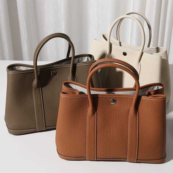 garden party designer totes new leather women's bag large capacity commuting bag tote bag versatile bag portable shopping bag handle 
garden party designer totes new leather women's bag large capacity commuting bag tote bag versatile bag portable shopping bag handle