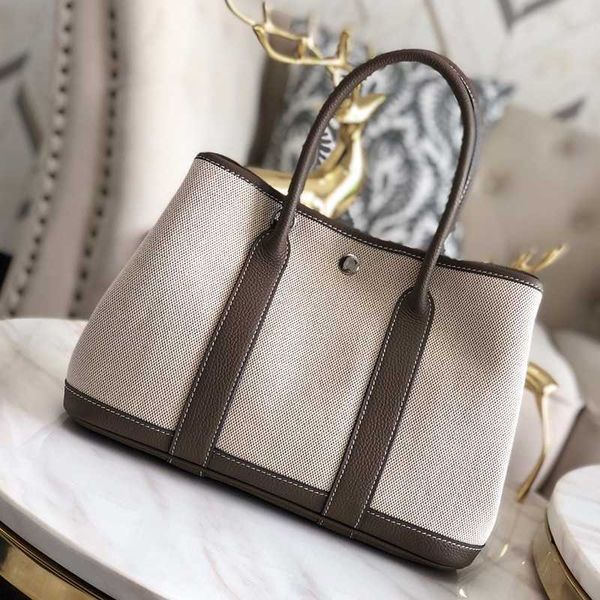designer totes garden party spring new handmade wax line canvas bag large capacity one shoulder crossbody handheld versatile shopping bucket
designer totes garden party spring new handmade wax line canvas bag large capacity one shoulder crossbody handheld versatile shopping bucket