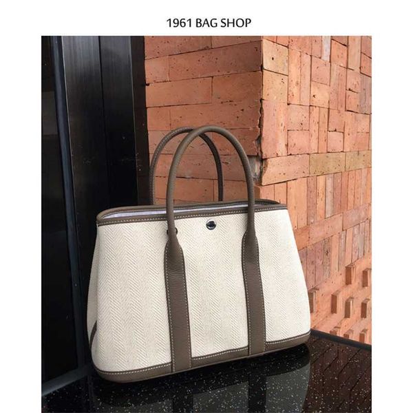designer totes garden party new layer cowhide togo bag with canvas 30 high-grade shopping bag tote women's bag handbag
designer totes garden party new layer cowhide togo bag with canvas 30 high-grade shopping bag tote women's bag handbag