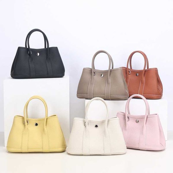 garden party designer totes new edition cowhide bag leather fashion large capacity tote bag wide shoulder strap shoulder bag commuter handba
garden party designer totes new edition cowhide bag leather fashion large capacity tote bag wide shoulder strap shoulder bag commuter handba