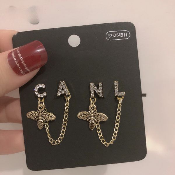 designer womens dangle earrings charm 18k gold plated chain earrings fashion party jewelry family love gift diamond earrings design for wome, Golden
designer womens dangle earrings charm 18k gold plated chain earrings fashion party jewelry family love gift diamond earrings design for wome, Golden